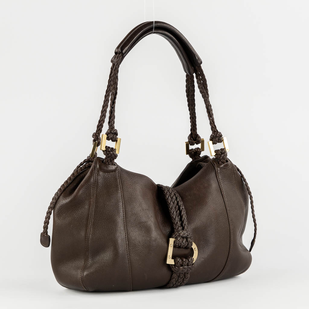 Delvaux Eugène PM, a brown leather handbag. (W:38 x H:26 cm)