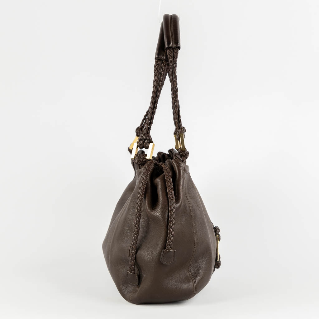 Delvaux Eugène PM, a brown leather handbag. (W:38 x H:26 cm)