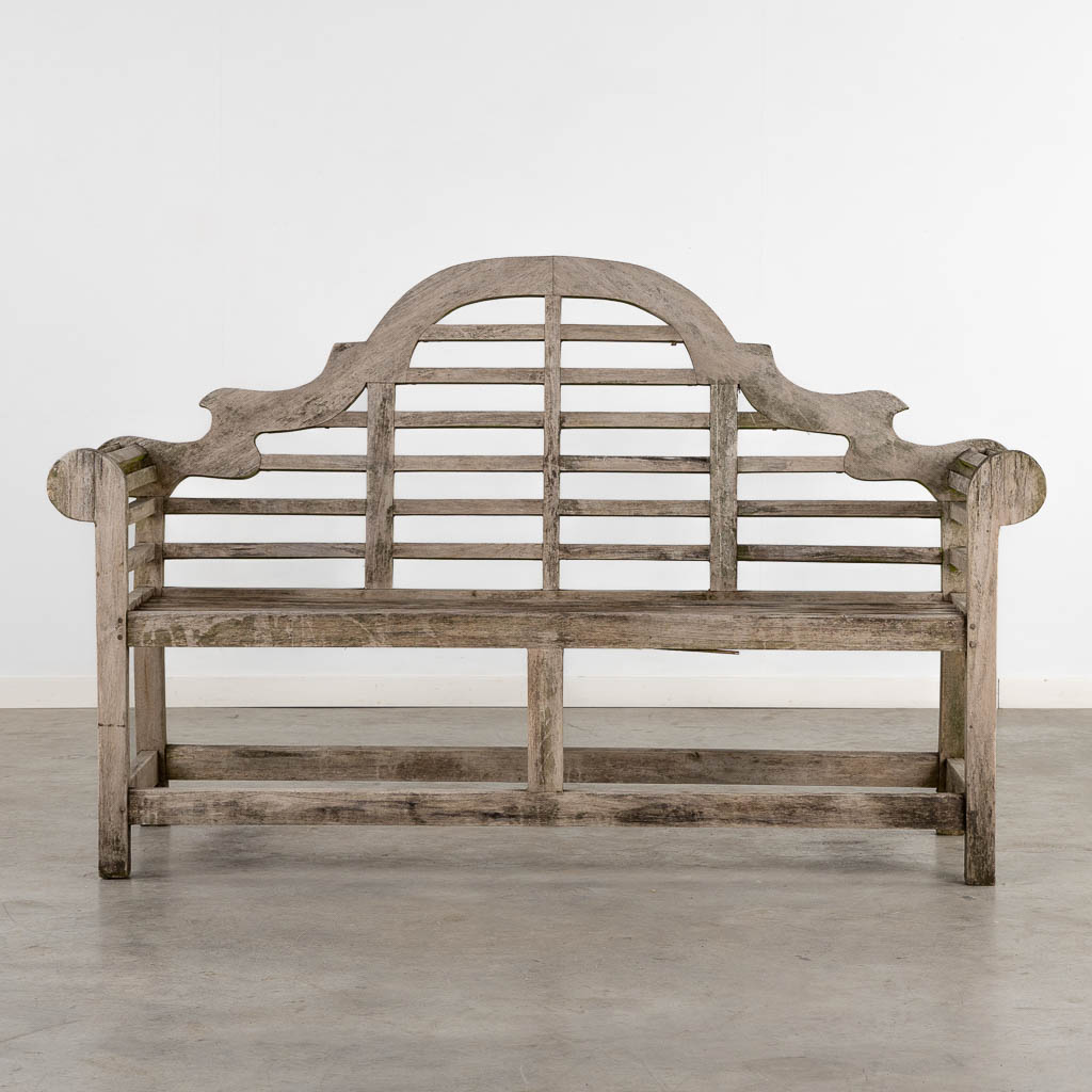 A teak garden bench. (L:60 x W:168 x H:104 cm)