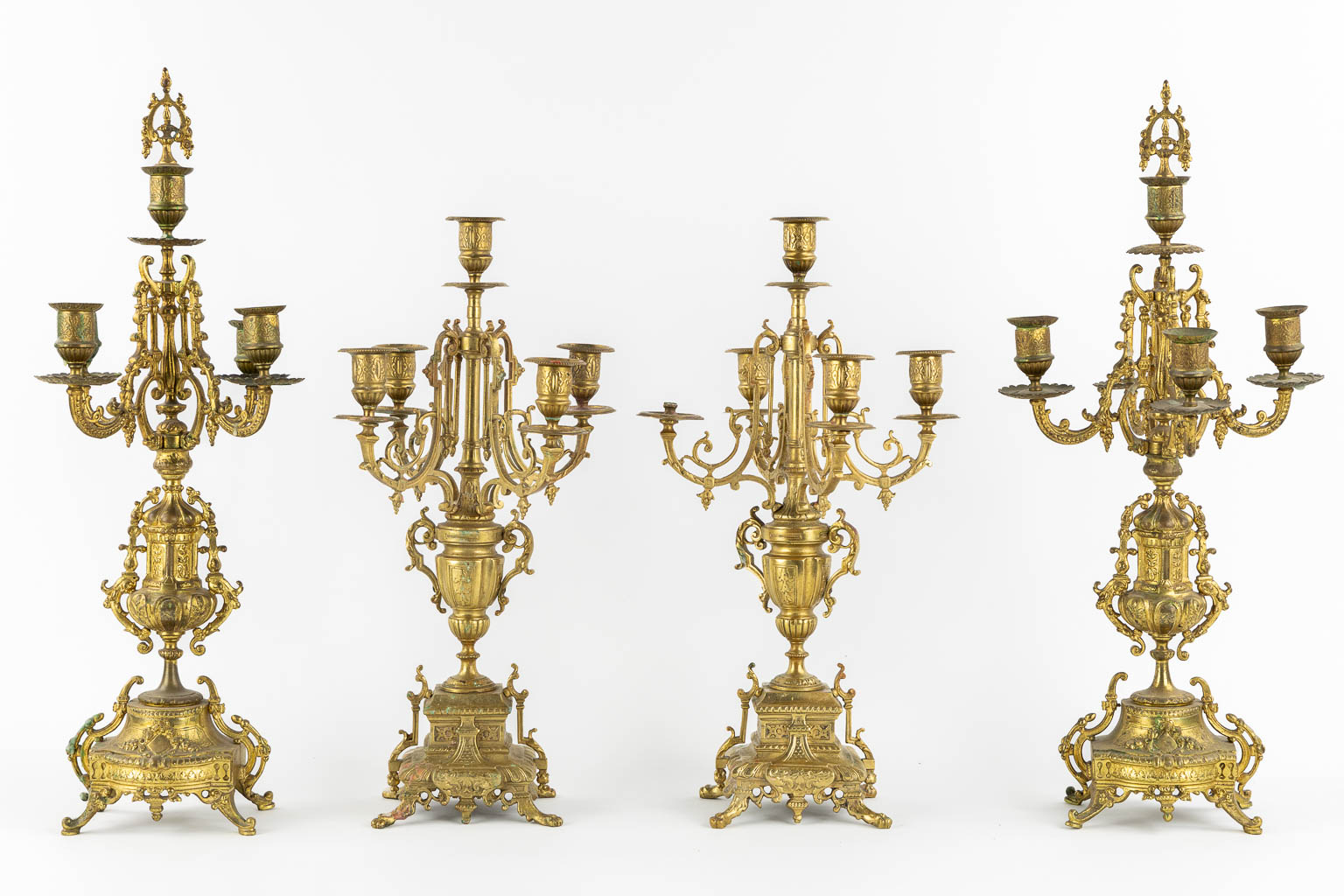 Two pairs of candelabra, bronze. (H:55,5 cm)