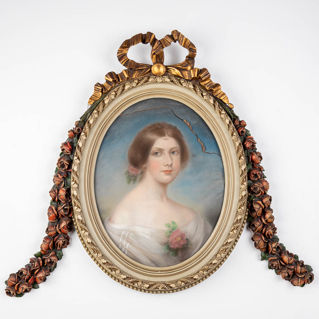 An antique frame with a portrait, wood sculptured in Louis XVI style. Portrait of a lady, gouache on paper. (W:107 x H:86 cm)