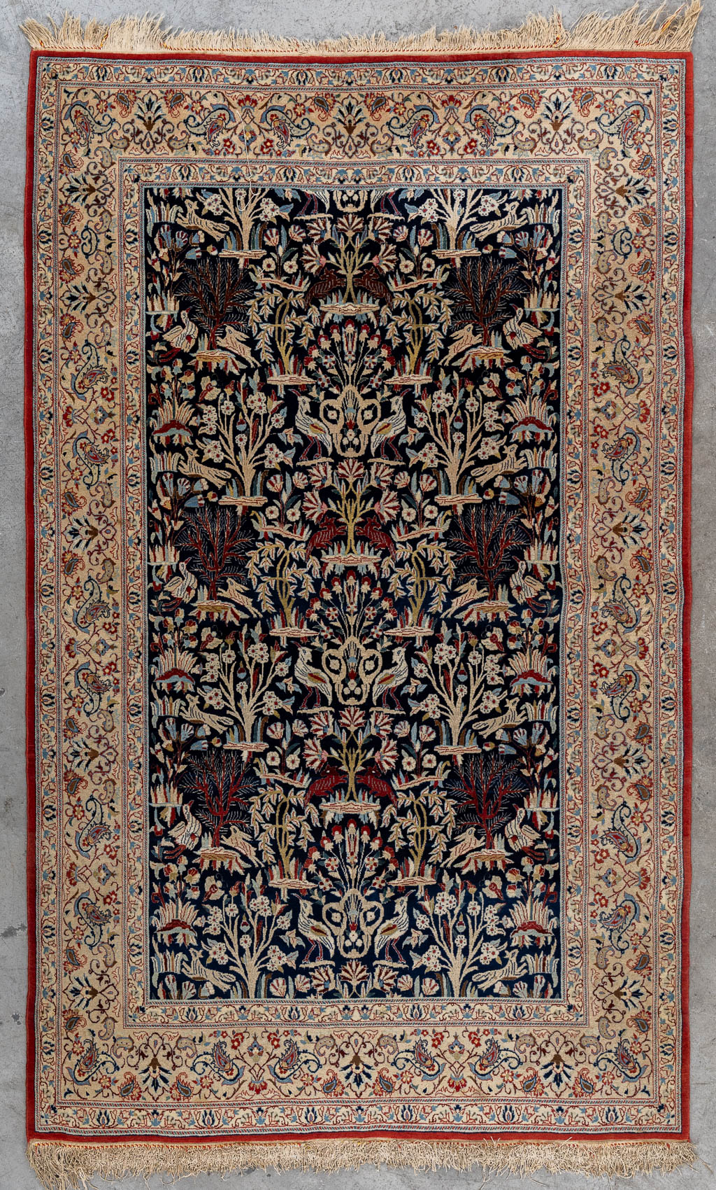 An Oriental hand-made carpet, birds and trees, Isphahan/Isfahan. (L:181 x W:107 cm)