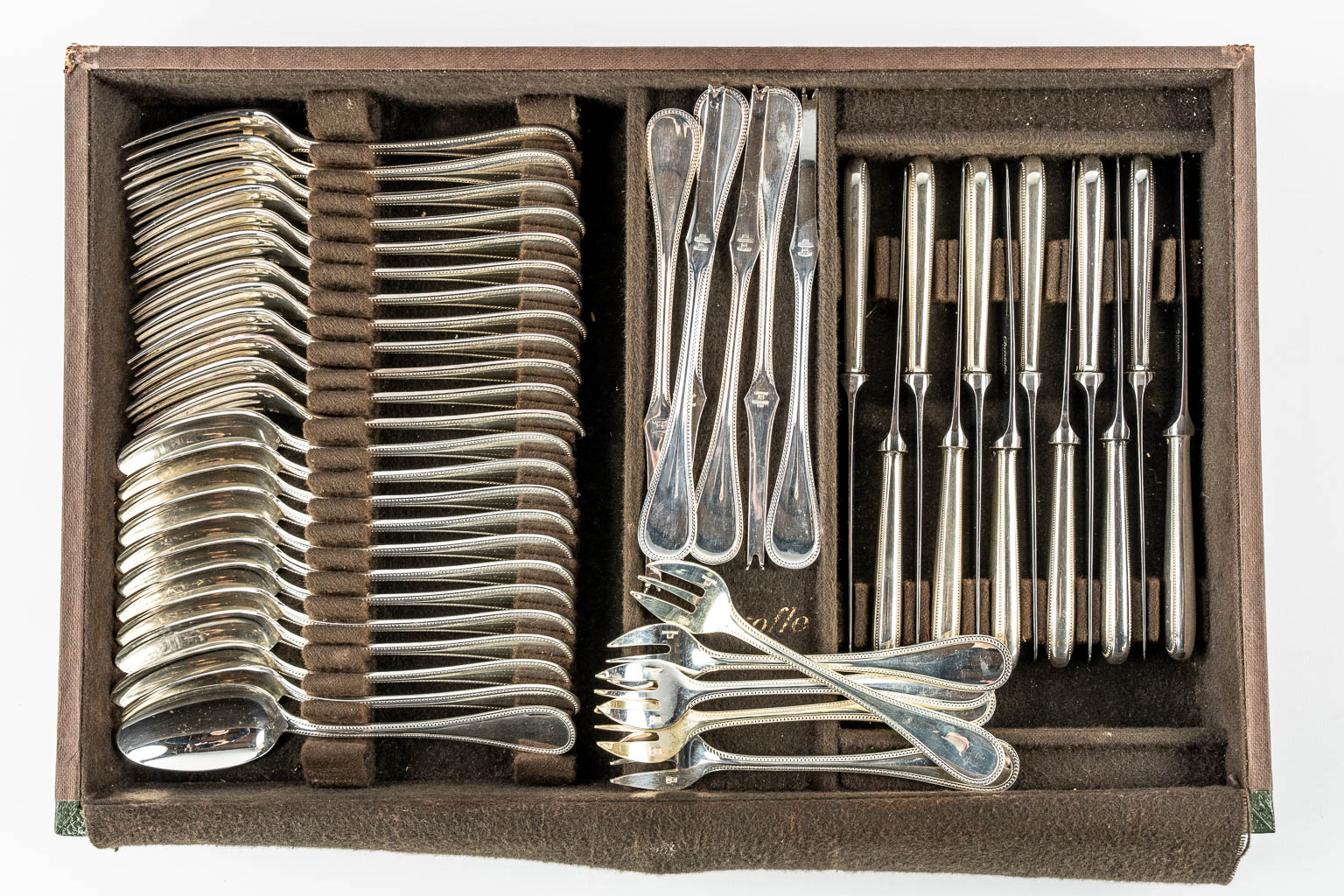 Christofle 'Perles' a 142-piece silver-plated cutlery in a Christofle chest with drawers. 