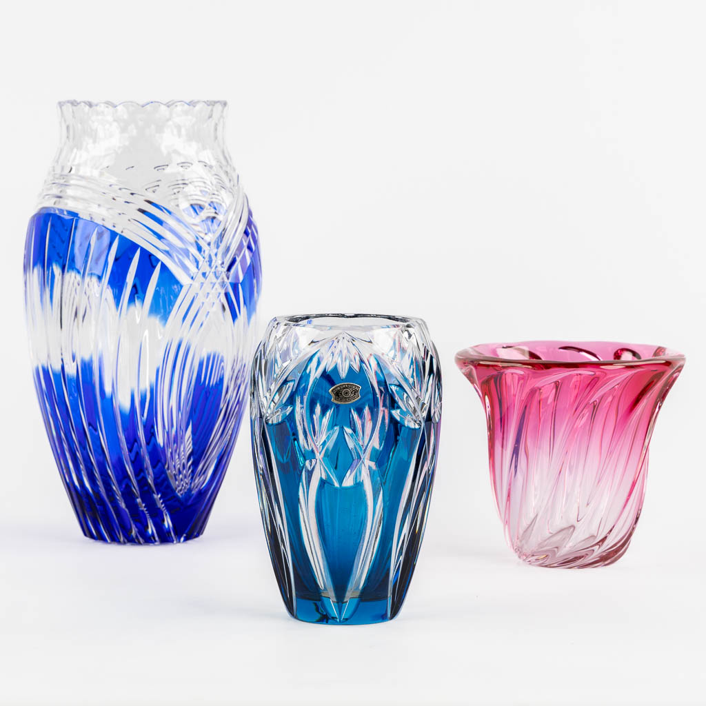 Val Saint Lambert, three coloured crystal vases. (H:29,5 x D:13,5 cm)