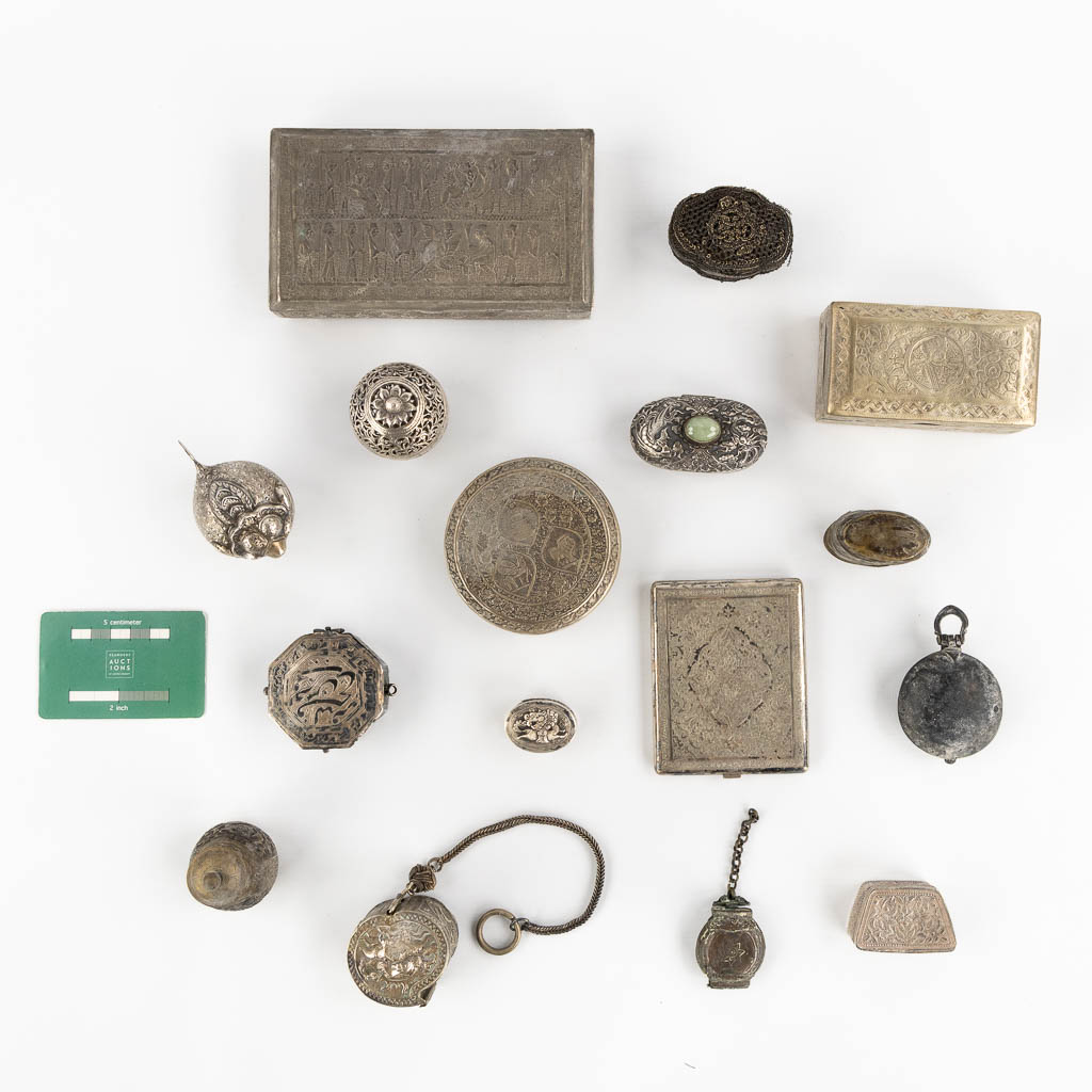 Fourteen Islamic and Indian Amulet or Trinklet boxes, Silver and silver-plate. 19th/20th C. (L:9,5 x W:16,5 x H:2,5 cm)