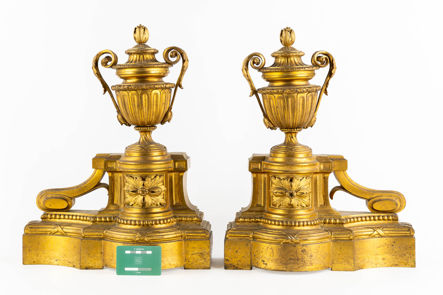 A fine pair of gilt bronze fireplace bucks, Louis XVI style. 19th C.