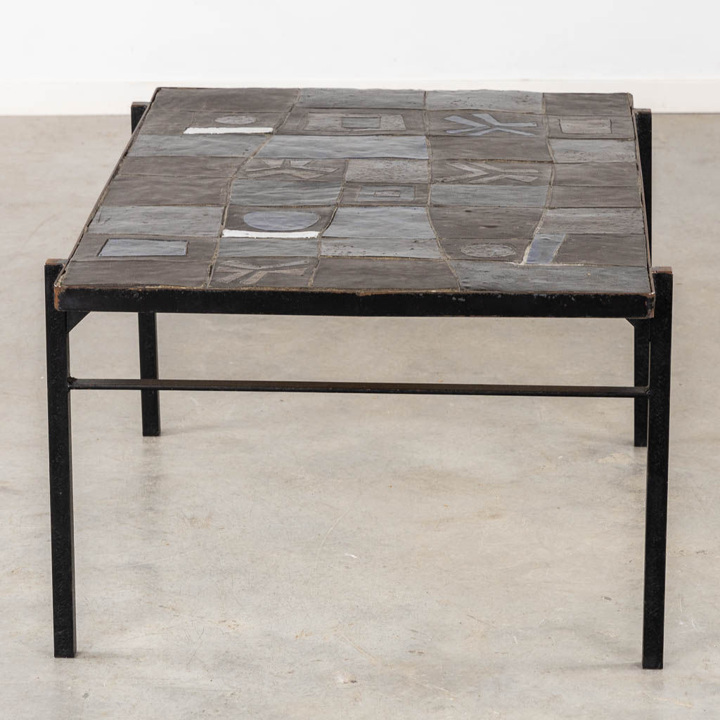 A mid-century coffee table, ceramic tiles on a metal base, circa 1970. (L:75 x W:110 x H:50 cm)