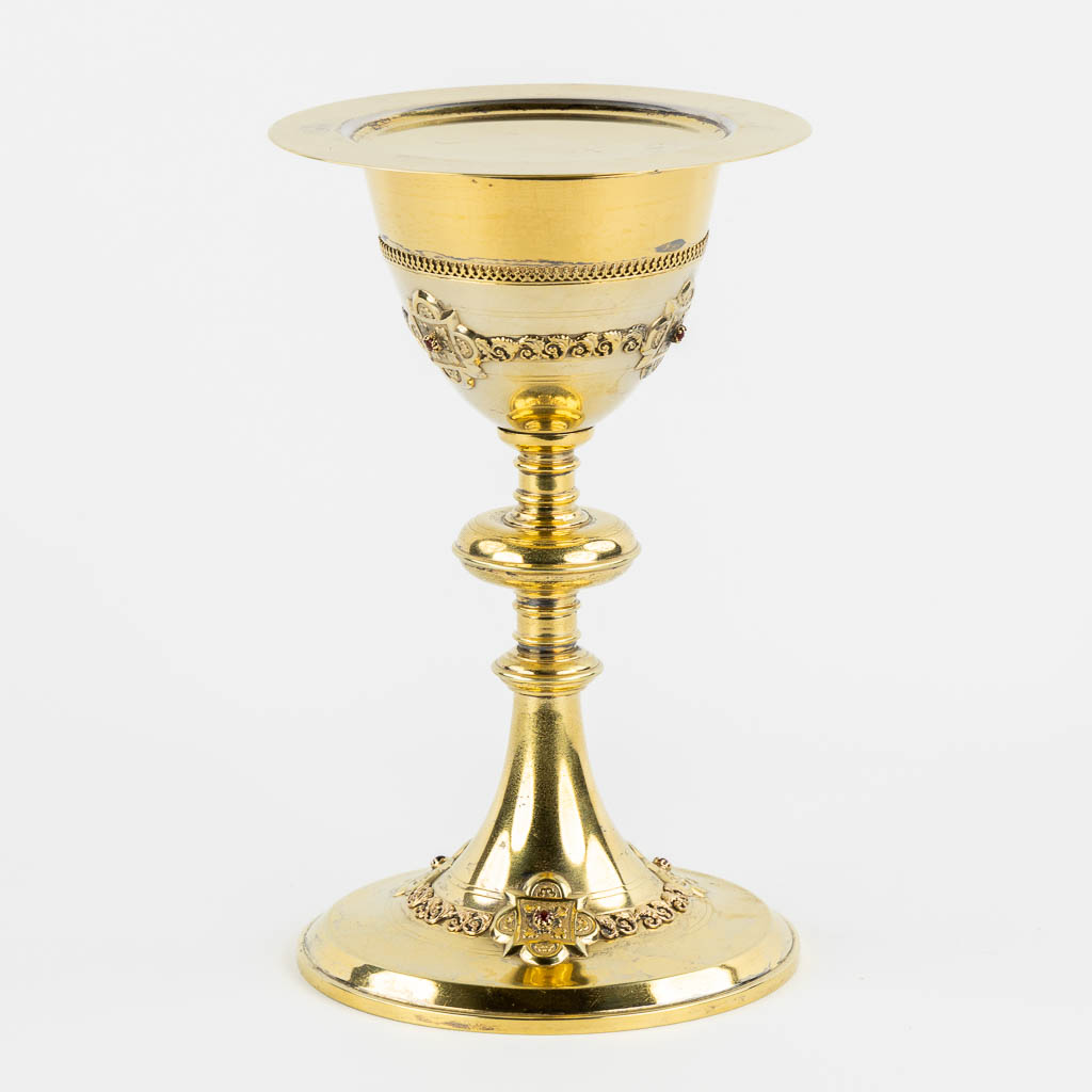 A Chalice, Gothic Revival with red cabochons, Added a silver paten, Bourdon, Ghent. (H:22 x D:13,5 cm)