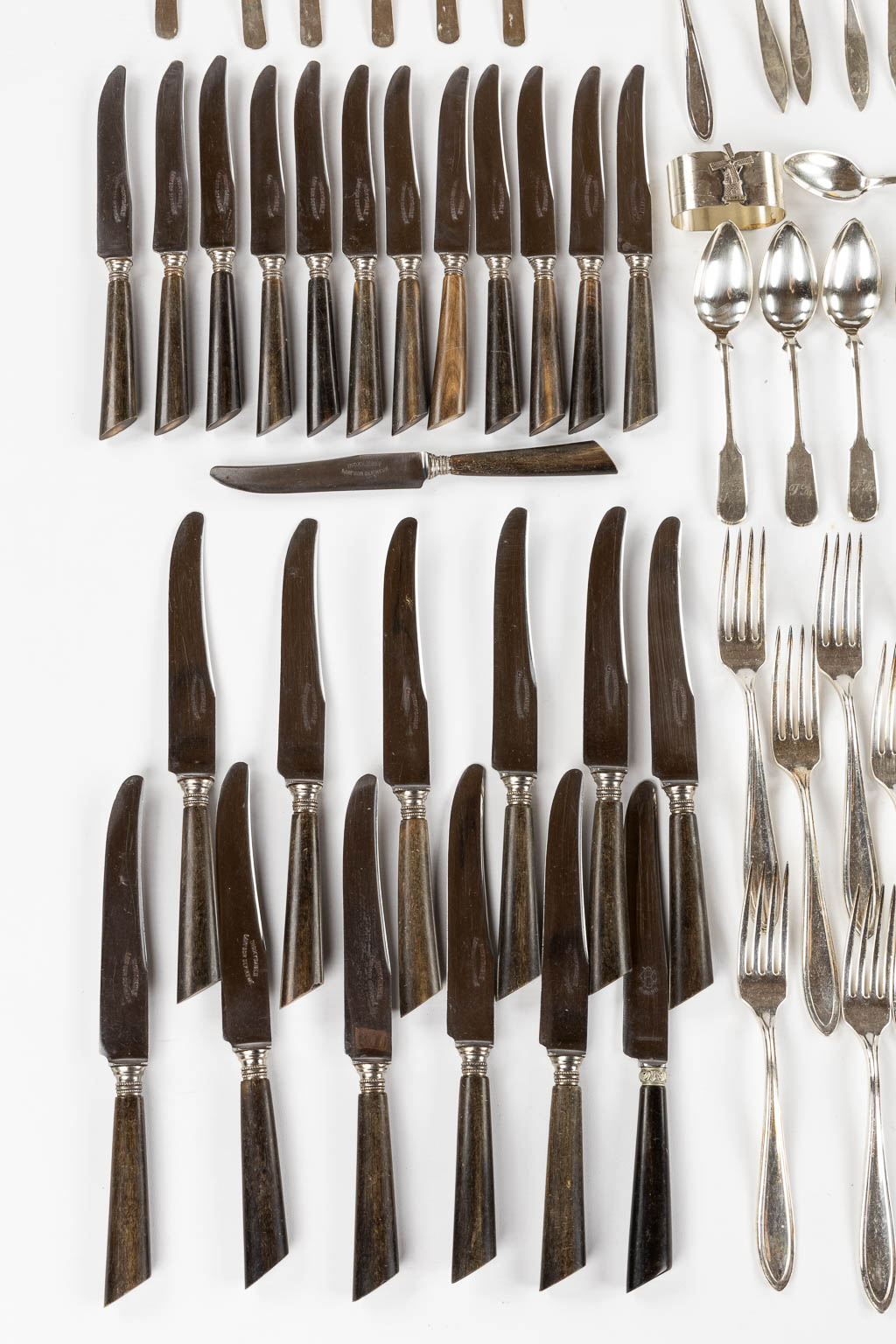 A large collection of silver and silver-plated cutlery. 