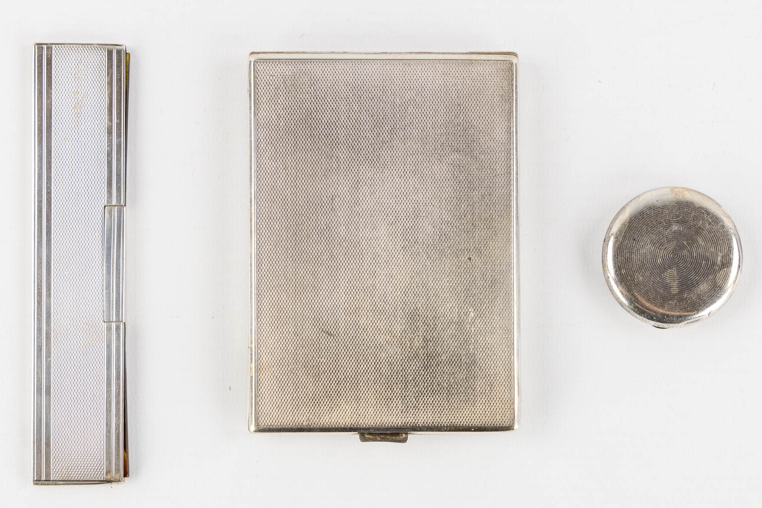 Wolfers, a silver jewellery or Cigar box, added are some silver objects. (L:8 x W:16 x H:6 cm)