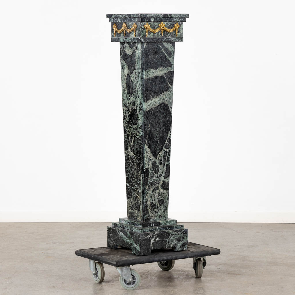 A green marble pedestal, mounted with bronze. (L:28 x W:28 x H:112 cm)