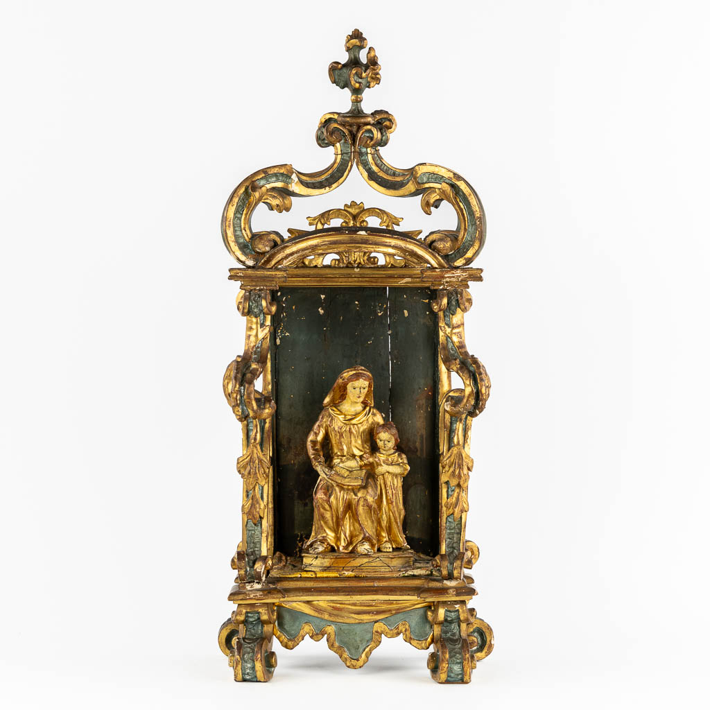 A Baroque Shrine and Madonna with Child. Sculptured, gilt and patanated wood. 18th C. (L:18 x W:31 x H:70 cm)