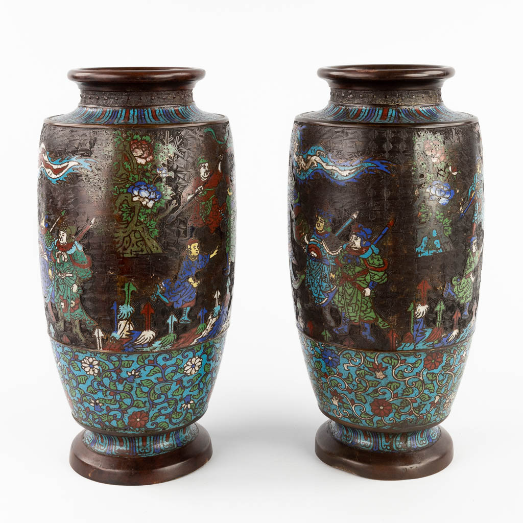 A pair of bronze vases with Champslevé decor. 19th C. (H:40 x D:20 cm)