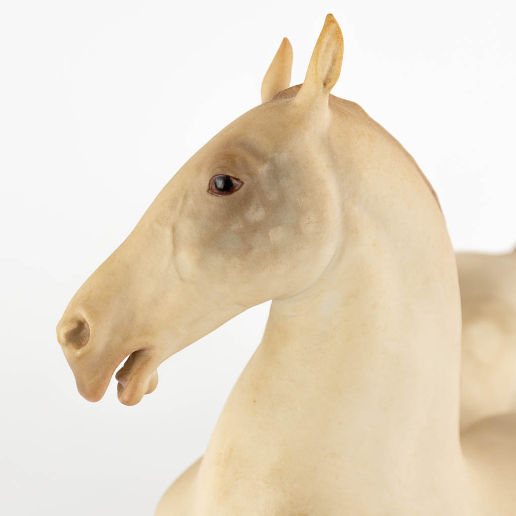 Hans ACHTZIGER (1918-2003) two running horses, bisque porcelain for Hutschenreuther. 20th C. (L:20 x W:41 x H:36 cm)