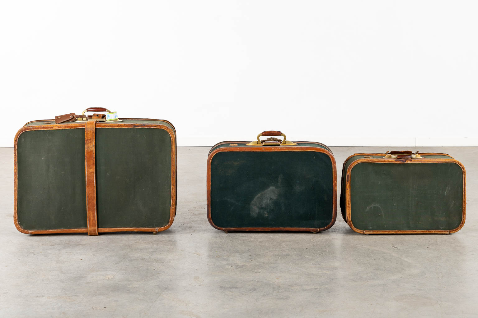 Delvaux, three travellers suitcases. (W:76 x H:52 cm)