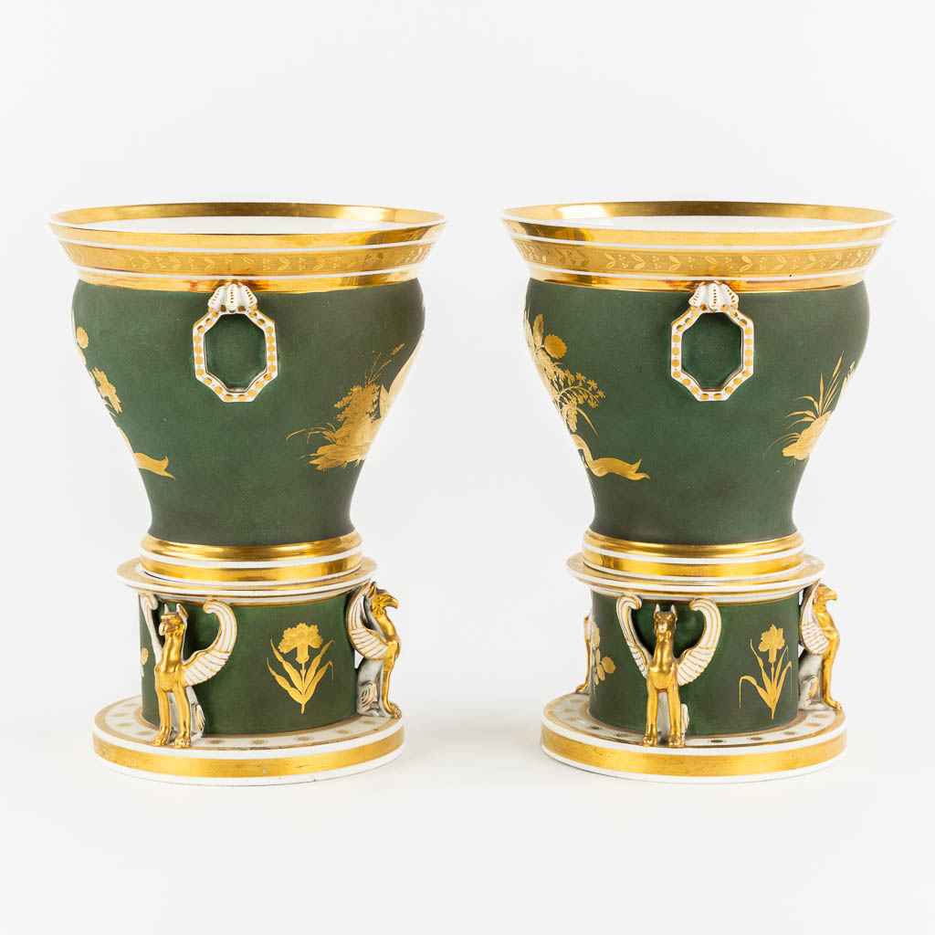 Fleury à Paris, a pair of porcelain cache-pots, Empire. 19th C. (H:27 x D:21 cm)