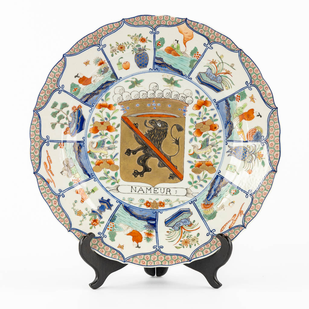 A Chinese Famille Verte Armorial 'Provinces' plate, 19th/20th C.