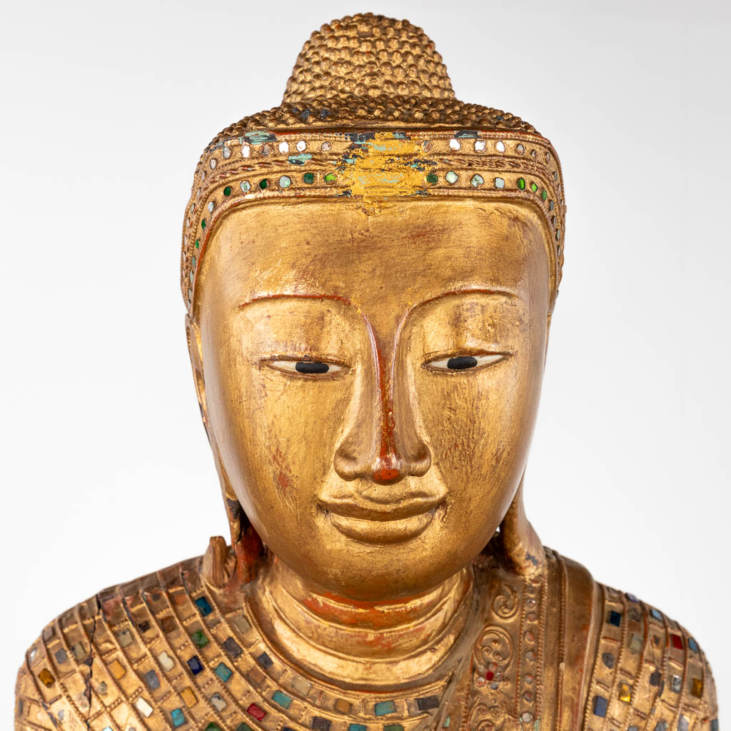 A large and Oriental buddha, wood-sculptured. (D:26 x W:55 x H:150 cm)