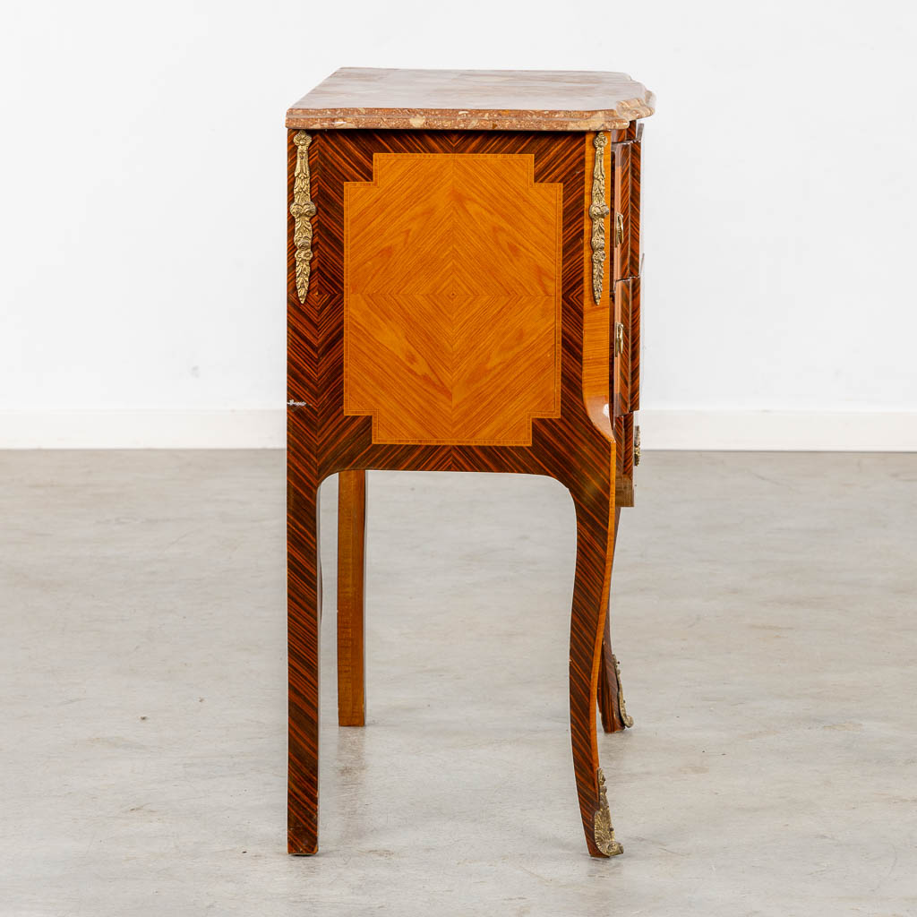 A two drawer side cabinet, marquetry inlay with a marble top. (L:39 x W:72 x H:81 cm)