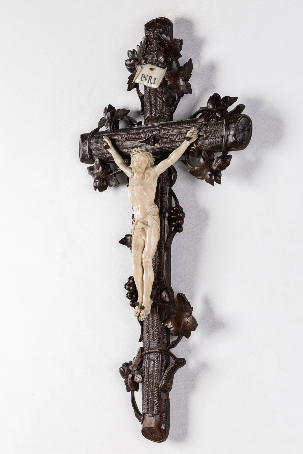 A wood-sculptured crucifix with an ivory 