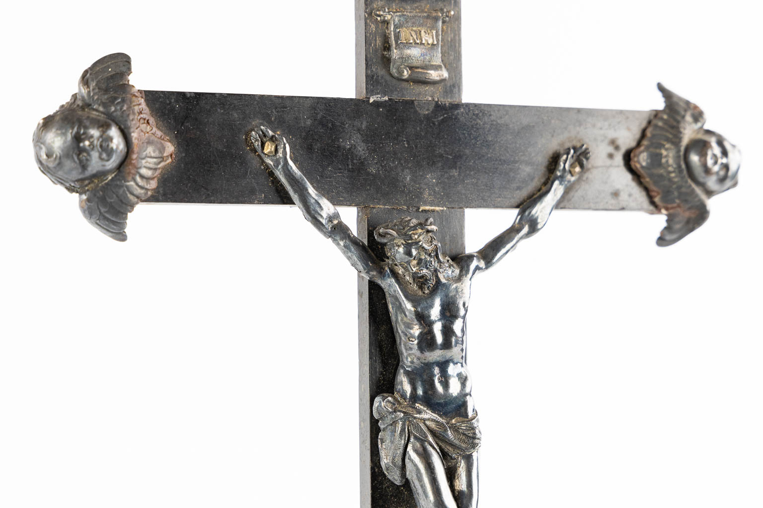 An ebonised wood Reliquary crucifix, 7 relics, mounted with silver. 19th C. (W:17 x H:50 cm)