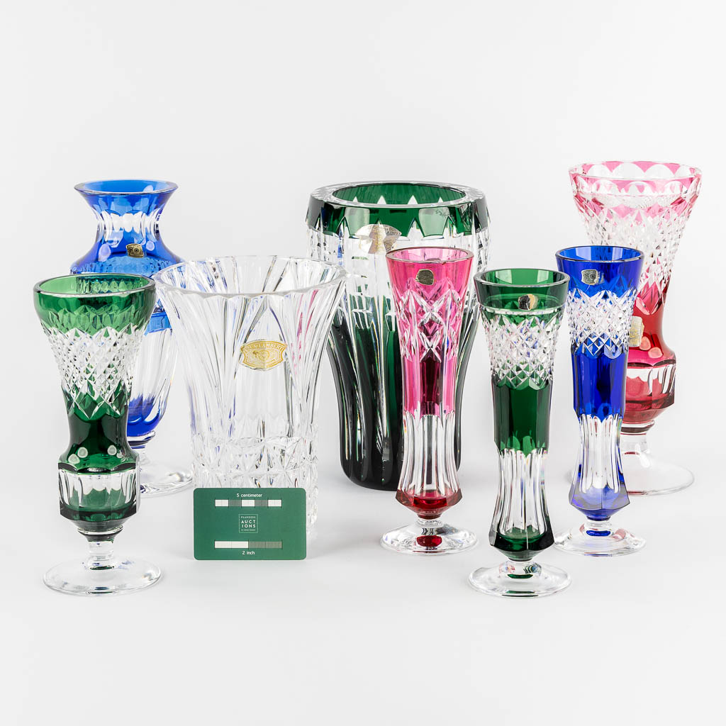 Val Saint Lambert, eight cut and coloured crystal vases. 