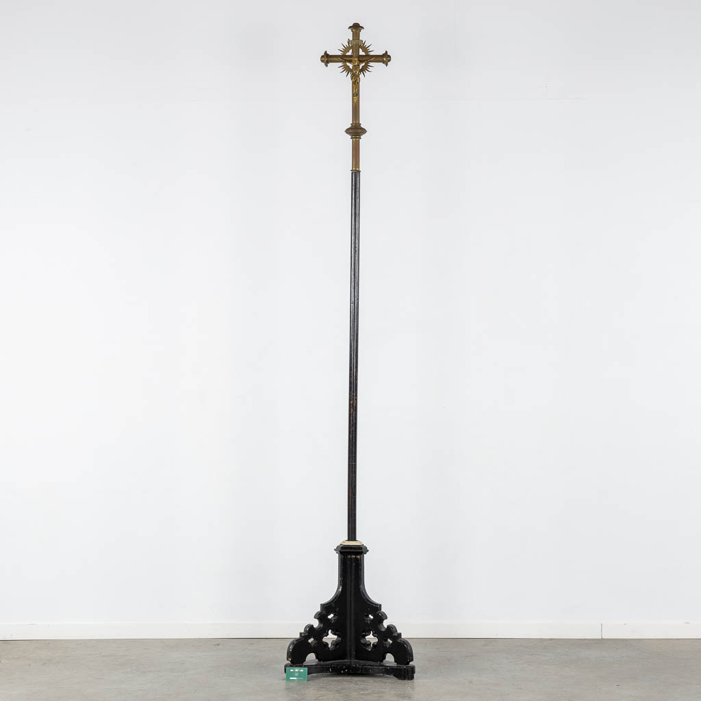 Four Processional crucifixes with their stands. Silver-plated metal and Brass. (H:265 cm)