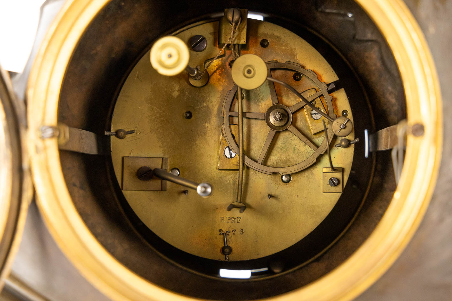 A large bi-coloured mantle clock 