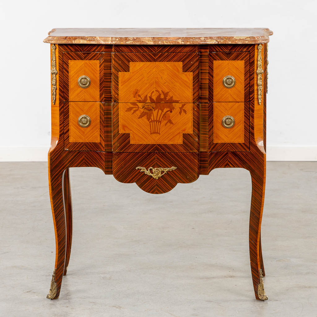 A two drawer side cabinet, marquetry inlay with a marble top. (L:39 x W:72 x H:81 cm)