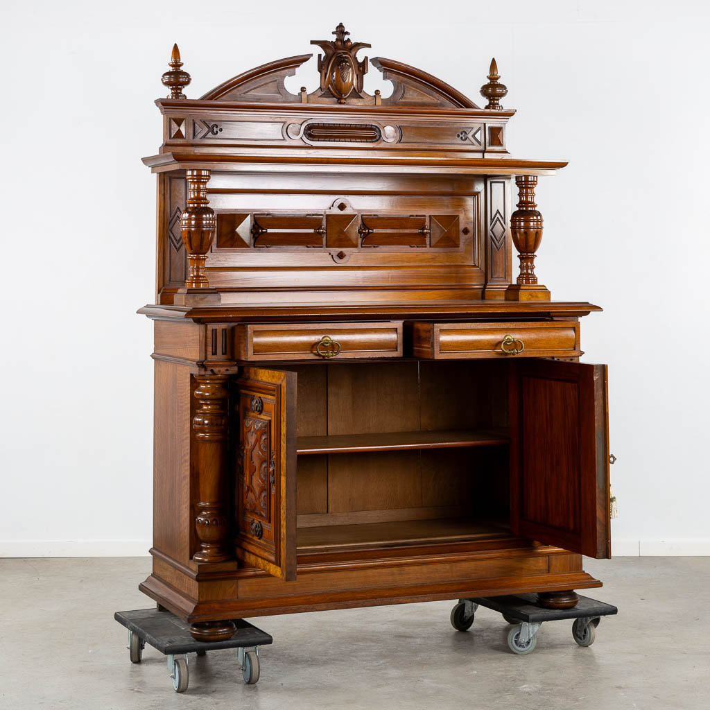 Arthur Etienne & Soeur, Bruxelles, a walnut dresser, Henry Deux. 19th C. (L:61 x W:150 x H:208 cm)