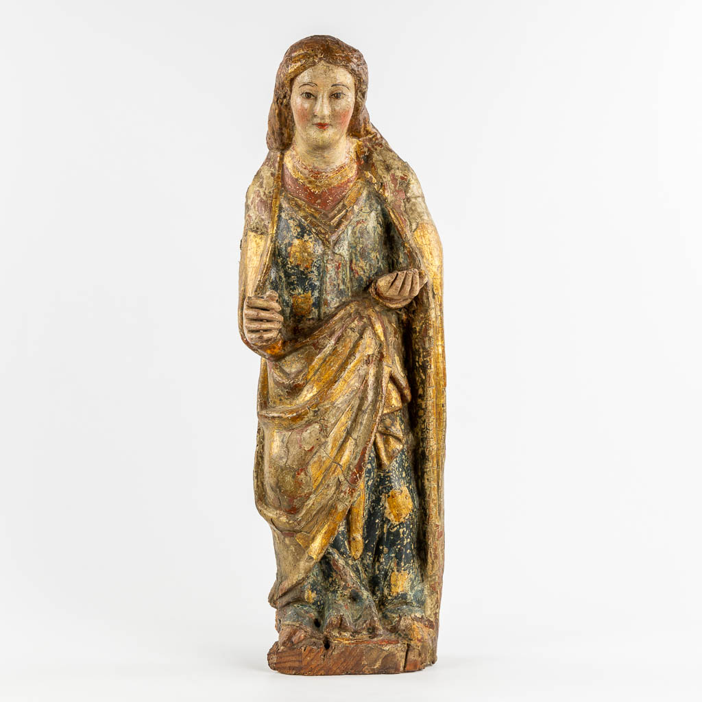 An antique wood sculptured figurine of a saint, polychrome, 14th C. (W:27 x H:78 cm)