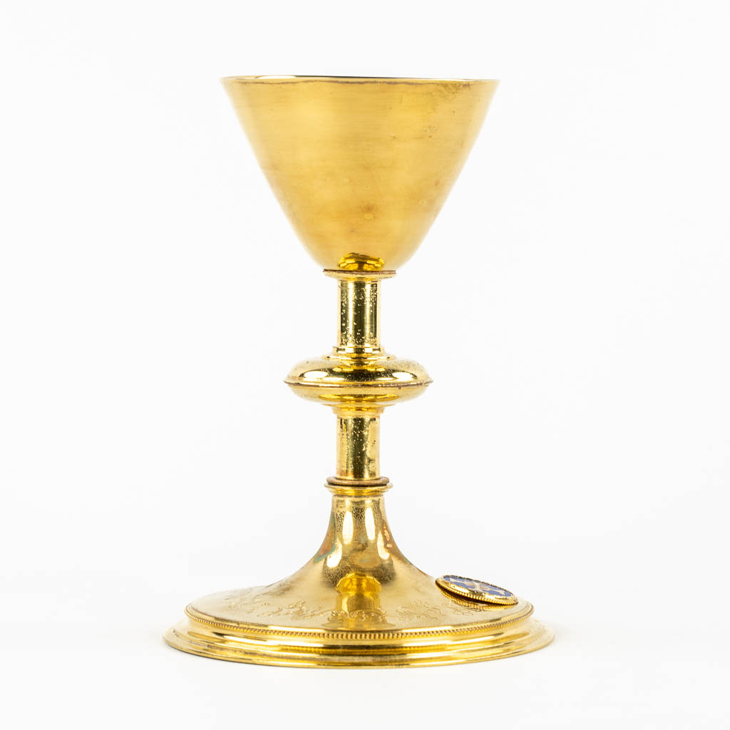 A Gothic Revival Chalice, gold-plated brass with an enamel plaque. 19th C.