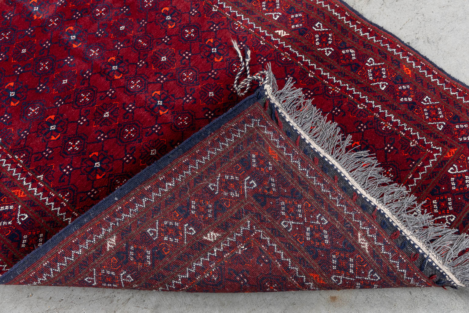 An Oriental hand-made runner, Afghan. (L:391 x W:85 cm)