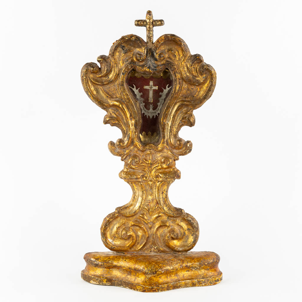 An antique wood-sculptured reliquary holder with a sealed relic of the true cross, Baroque, 18th C.