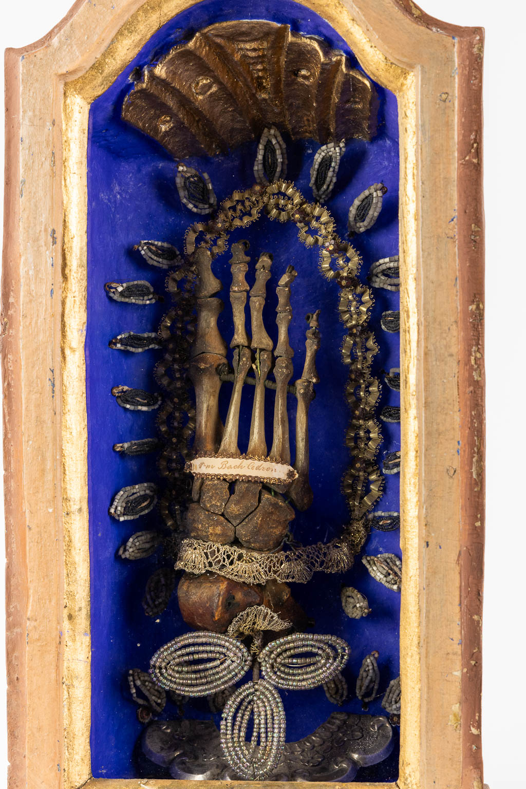 A reliquary cabinet with a relic of a foot, VM. Bach Cedron, dated 1768.