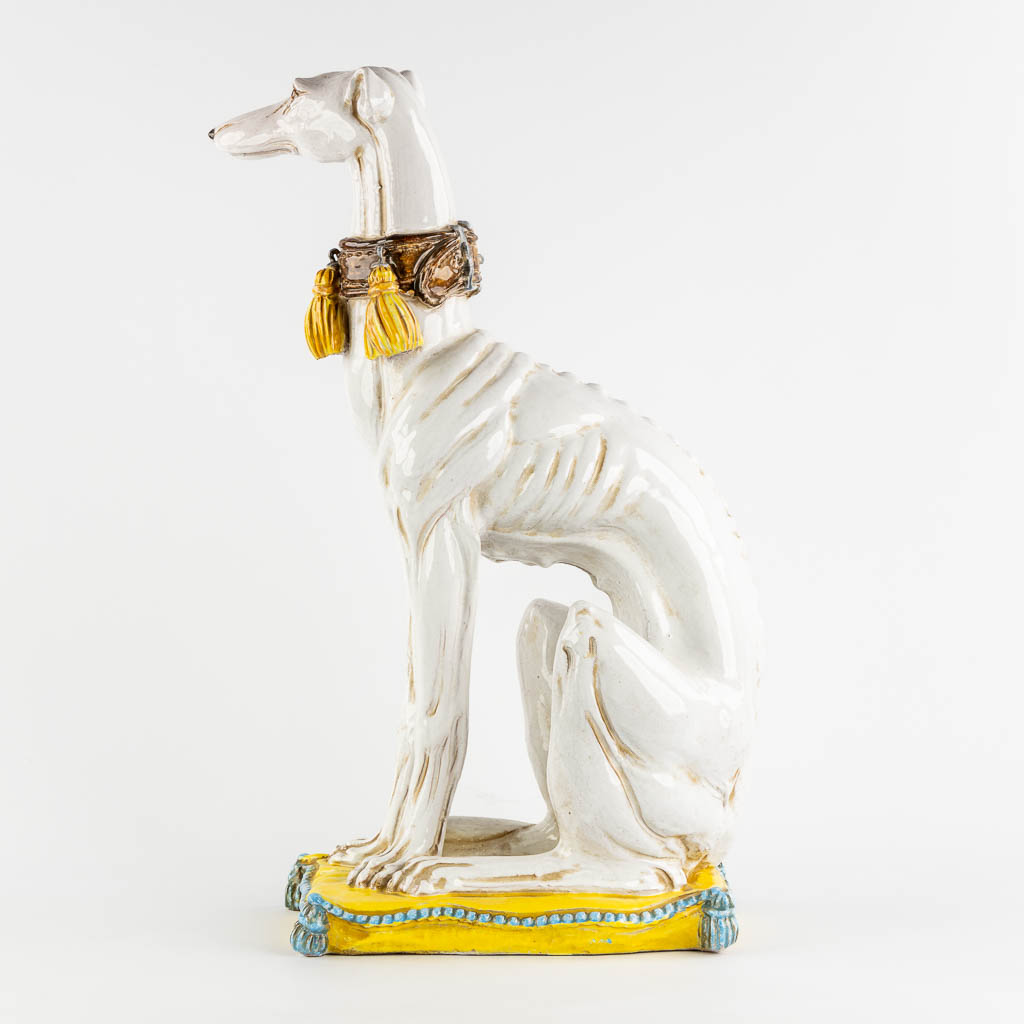 Figurine of a Greyhound, glazed terracotta. Italy, 20th C. (L:24 x W:42 x H:67 cm)