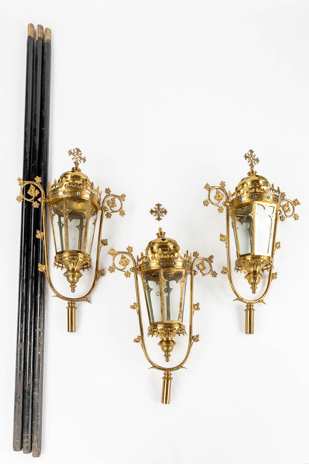 Three Processional lanterns, brass finished with cabochons, Gothic Revival. (W:48 x H:82 cm)