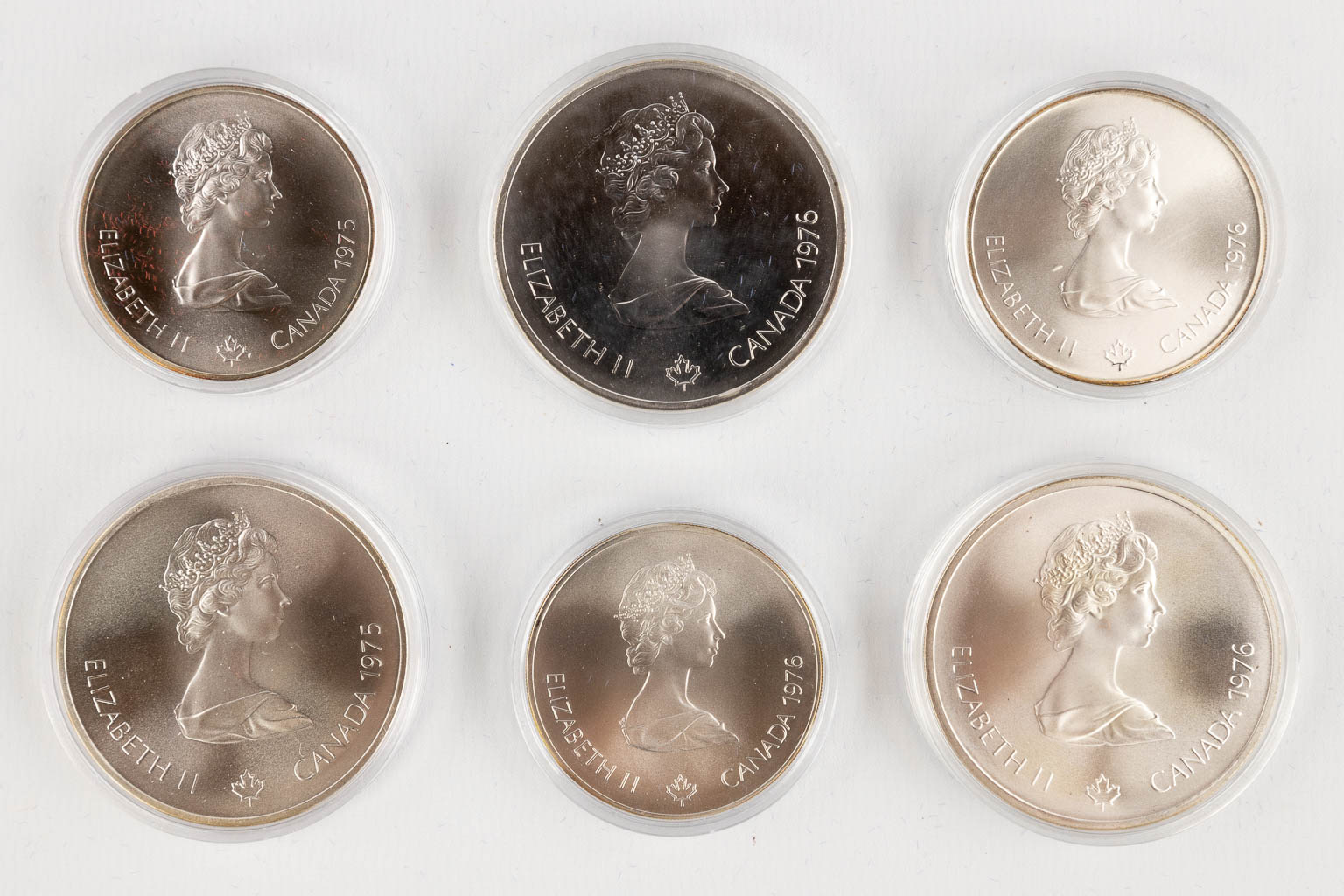 Canadian Olympic Silver Coins 1976, for the Olympic games in Montreal. (D:22,5 x W:40 x H:5 cm)