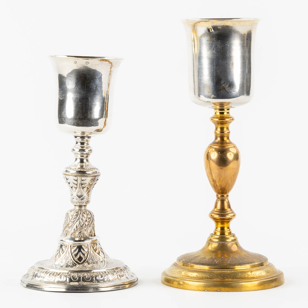 Two chalices with a silver cuppa, on a silver-plated and copper base.