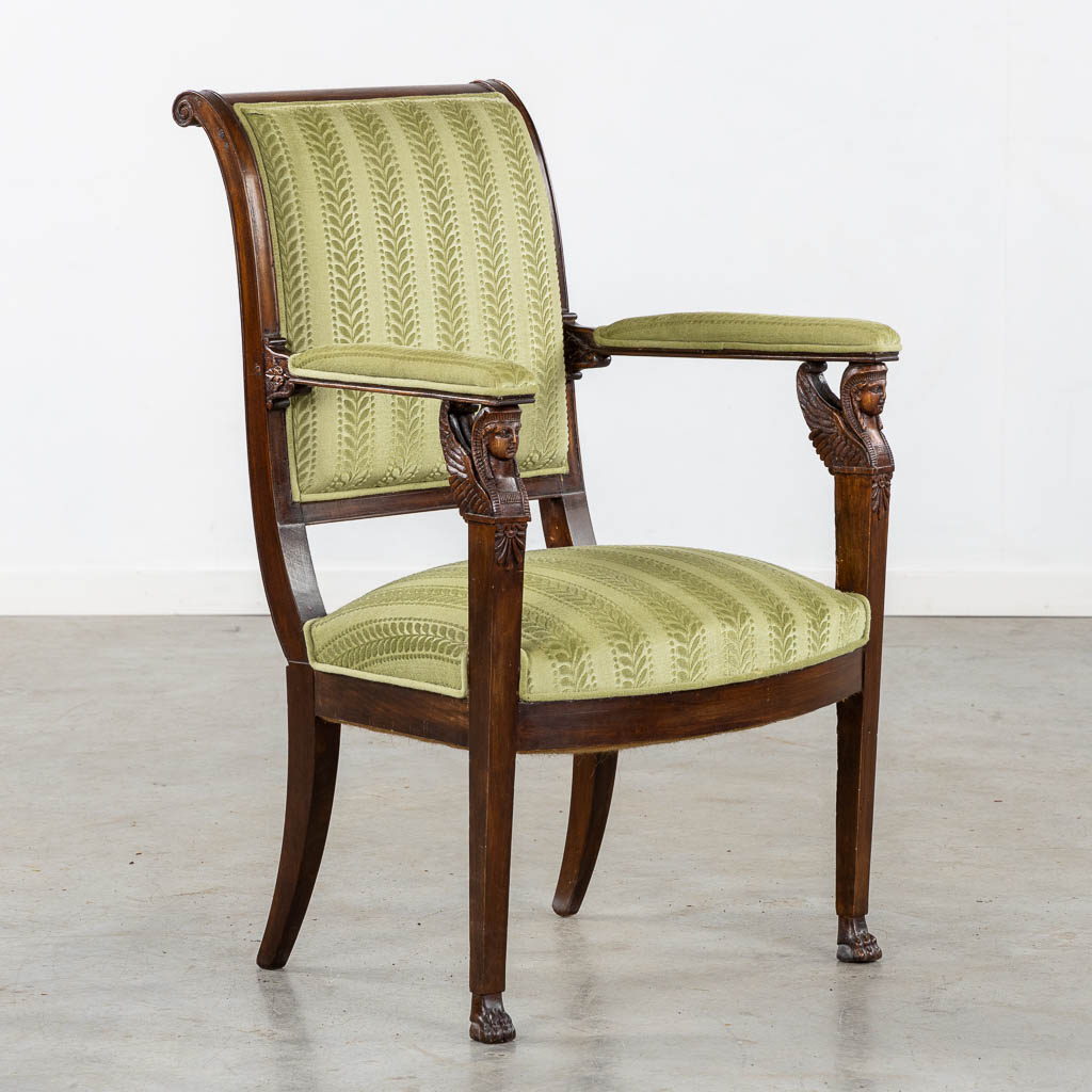 An antique armchair, sculptured wood in Empire style. (L:60 x W:59 x H:91 cm)