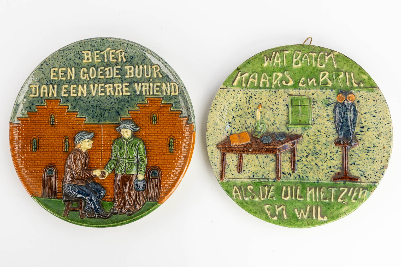 Eight plates with 'Proverbs and Sayings' made of Flemish Earthenware. 