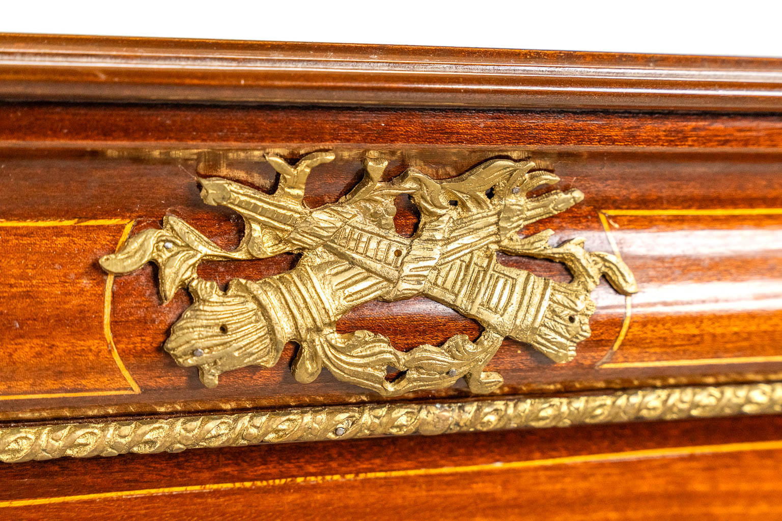 A single door cabinet, marquetry inlay mounted with bronze. 20th C. 