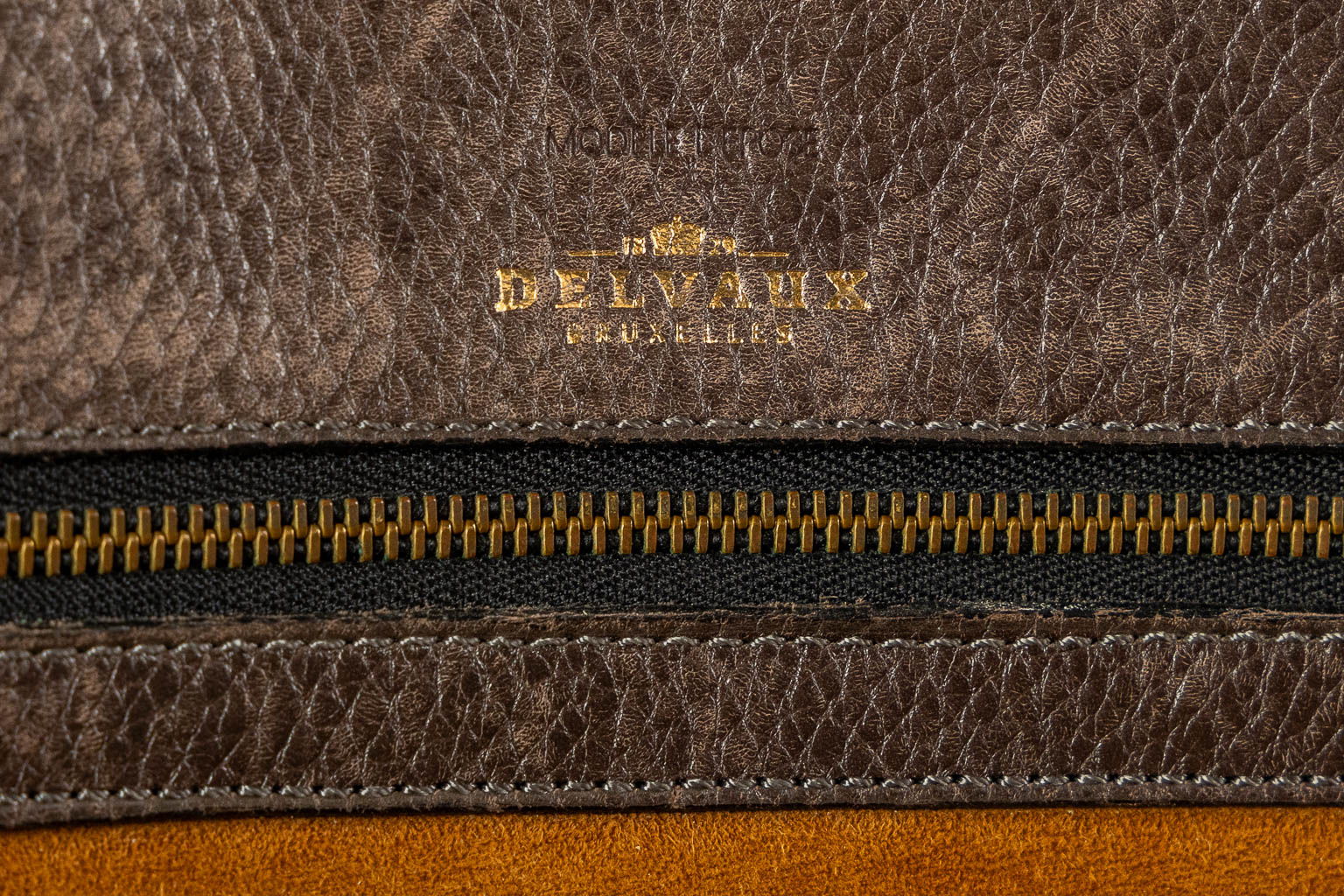 Delvaux, a brown leather 'Toile De Cuir' handbag, circa 1990. 