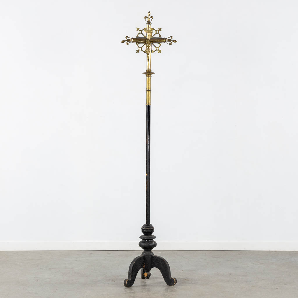 Four Processional crucifixes with their stands. Silver-plated metal and Brass. (H:265 cm)