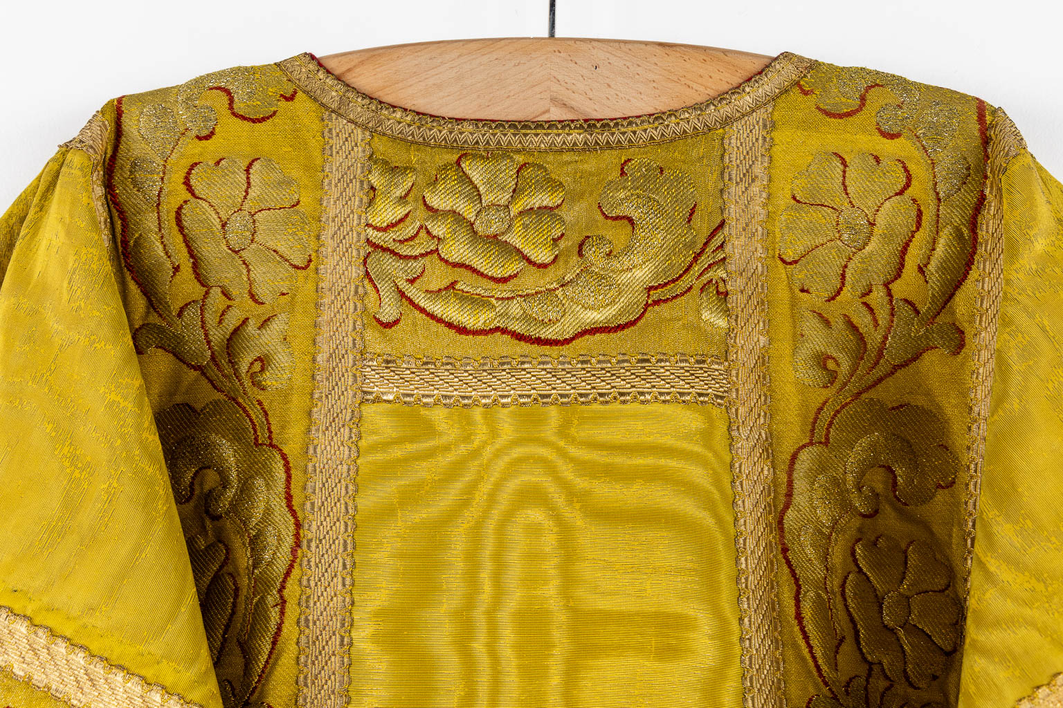 A Cope, a pair of Dalmatics and Two Roman Chasubles, Embroideries.