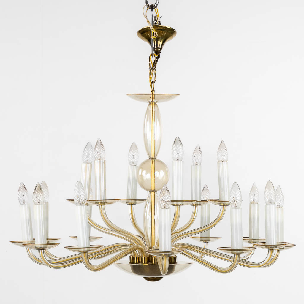 A Bohemian tinted glass chandelier, 18 points of light. (H:65 x D:89 cm)