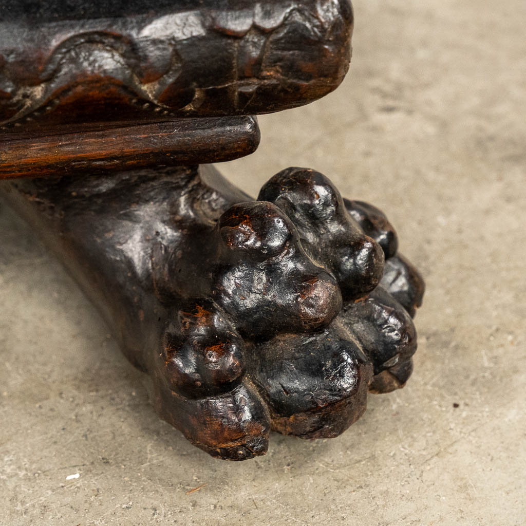 An antique Italian 'Cassone', standing on claw feet and finished with Caryatids. 17th/18th C.