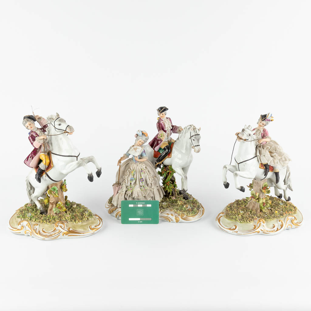 Capodimonte, three groups with horses, 20th C. (W:22 x H:26 cm)