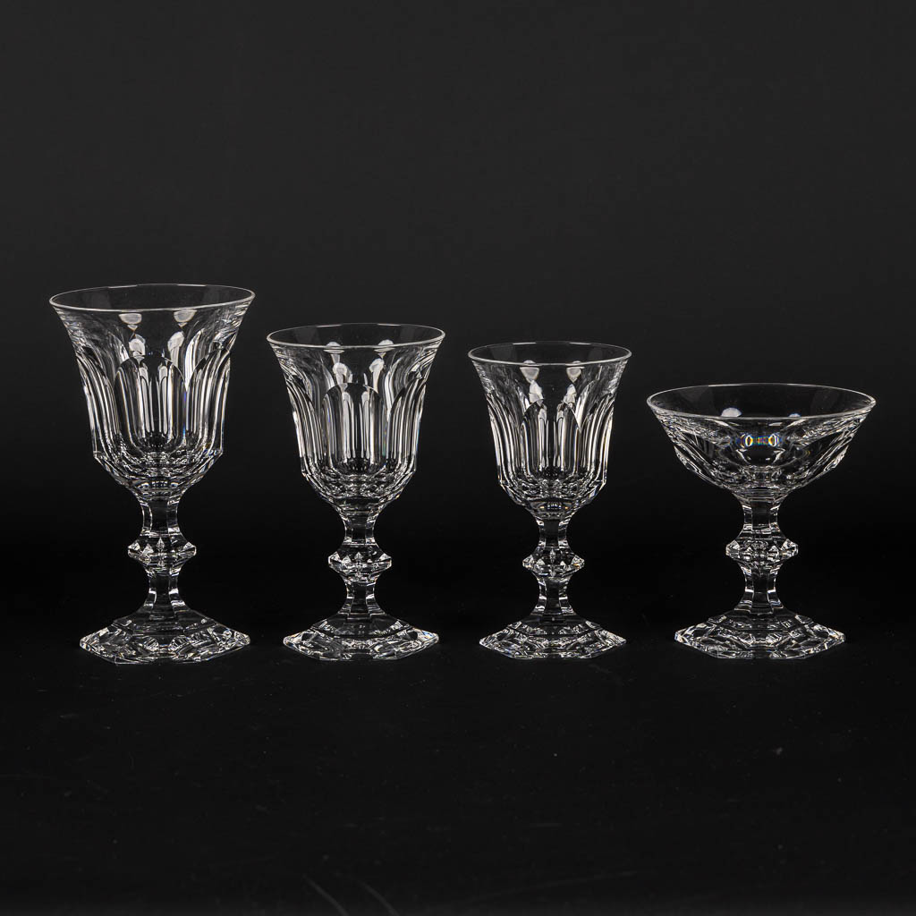 Val Saint Lambert, 'Metternich', 60 crystal glasses, coupes and goblets. (H:16 cm)