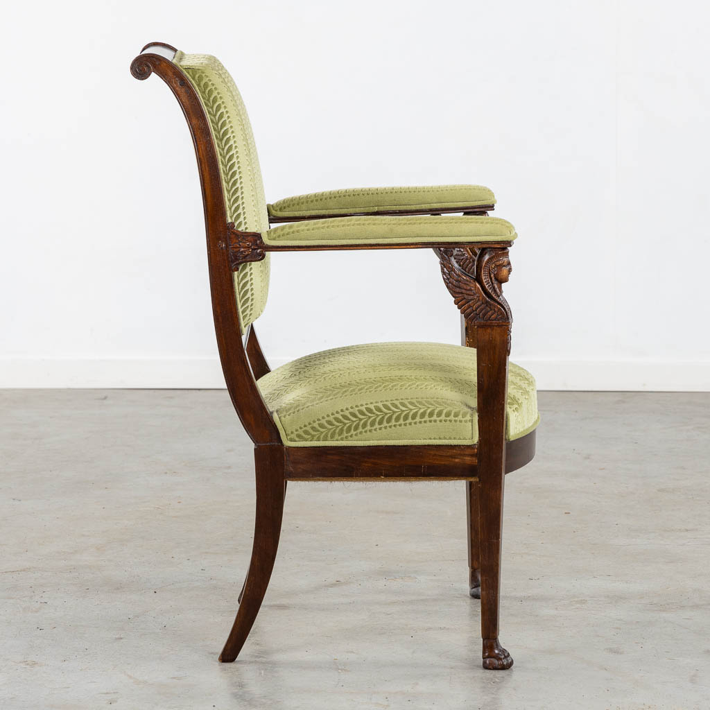 An antique armchair, sculptured wood in Empire style. (L:60 x W:59 x H:91 cm)